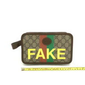 Gucci Supreme clutch leather GG bag